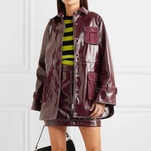 GANNI CANVAS-PANELED FAUX PATENT-LEATHER JACKET IN BURGUNDY